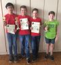 Siegerehrung U12: Simon Lichtinger (2.), Maxim Klein (1.), Jakob Paringer (3.) und das beste Maedchen Antonia Birchinger.jpg