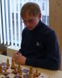 P1180728 = Marius Kristiansen, der sich an Brett 6 ausser Konkurrenz mit einem sicheren Sieg gut einfuehrte.JPG